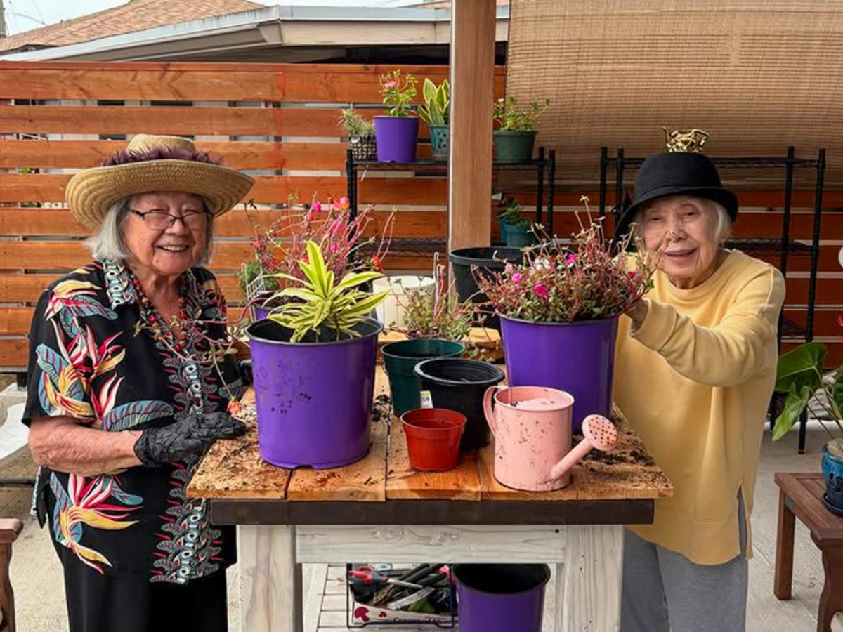 image of ladies doing gardening at Valley Comfort Care Home.